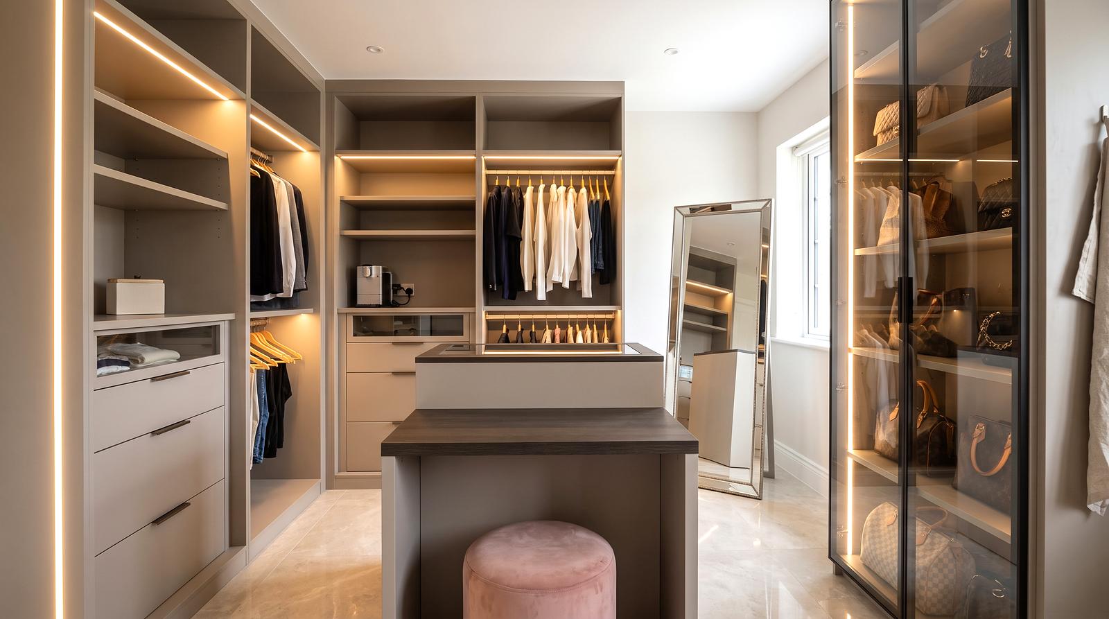 Completed dressing room with island and glass-fronted display